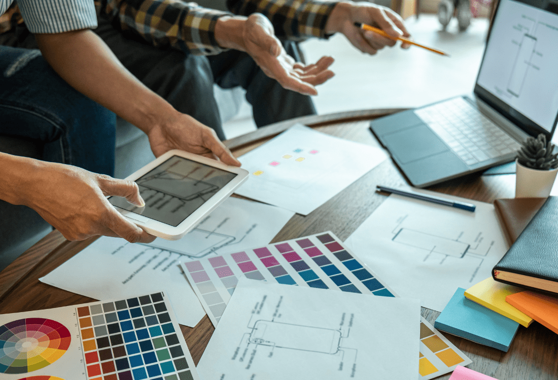 A team of app developers looking at the future of high-end native mobile app development.